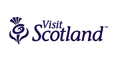 VisitScotland logo with a purple stylized thistle and dark blue text on white background