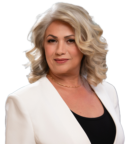 Portrait of a woman with blonde hair wearing a white blazer over a black top, against a white background