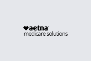 Aetna logo in black on a light gray background.