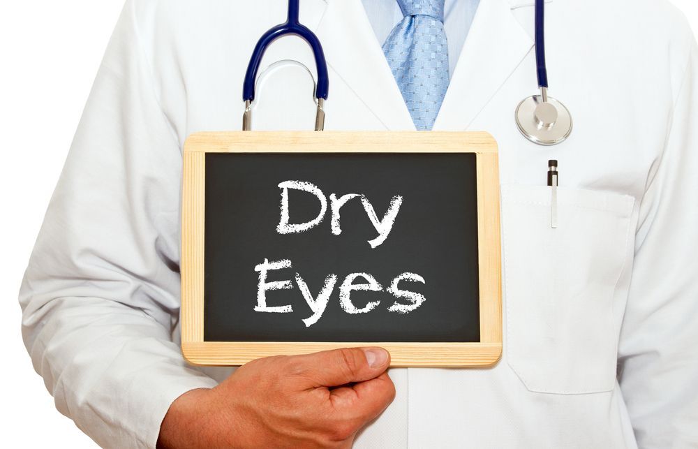 doctor holding dry eyes sign