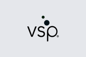 VSP logo in black with teal dots on a light gray background