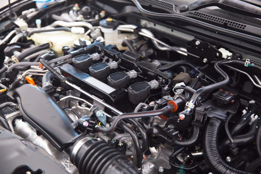 A Close Up Of The Engine Of A Car With The Hood Open — Tim Warren Auto Airconditioning & Electrical In Bowen, QLD