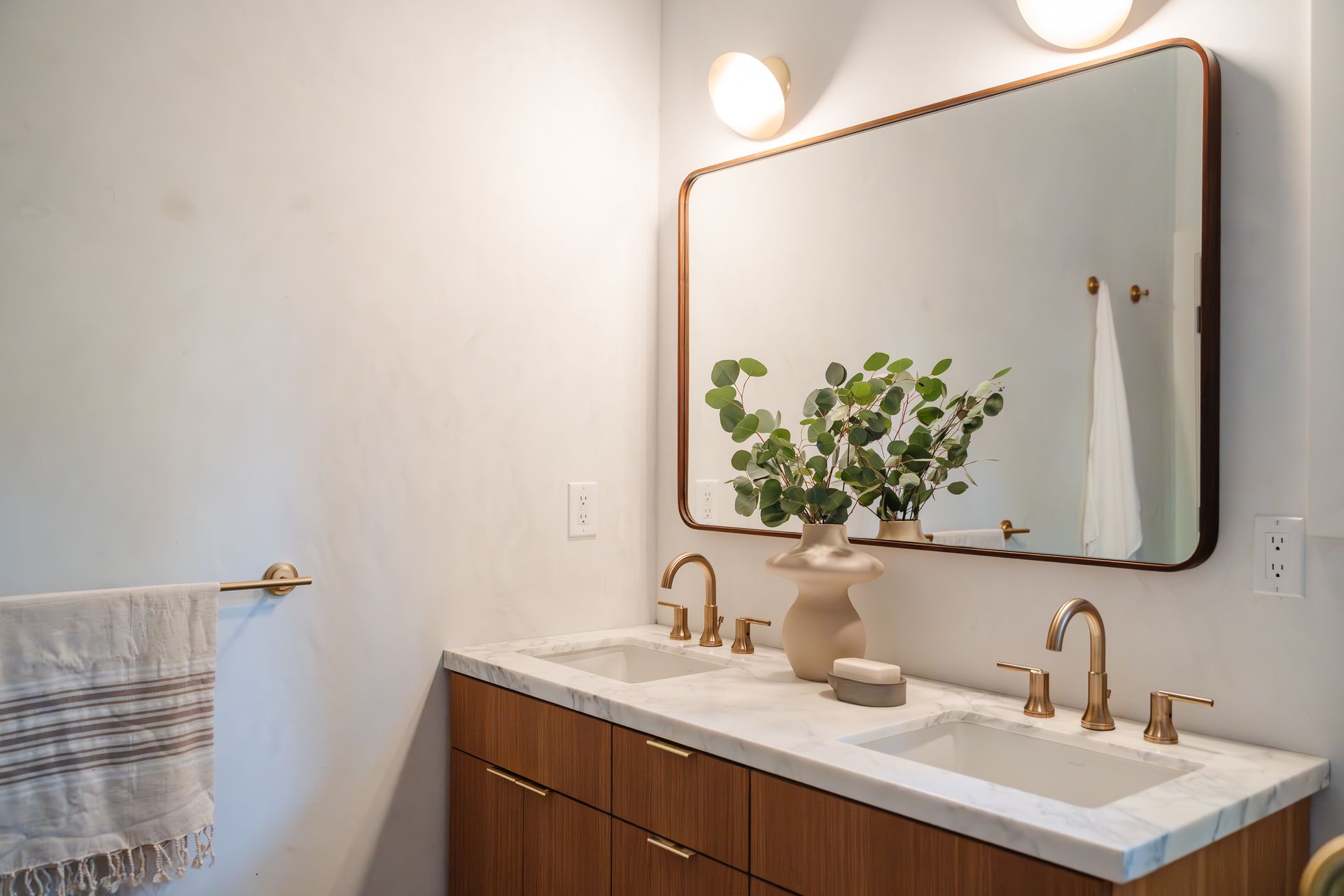 Larchmont Village bathroom with double vanity sinks