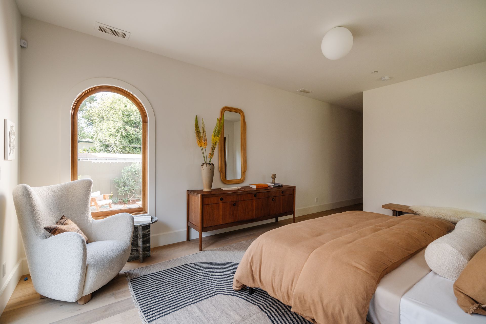 Larchmont Village master bedroom with lounge chair