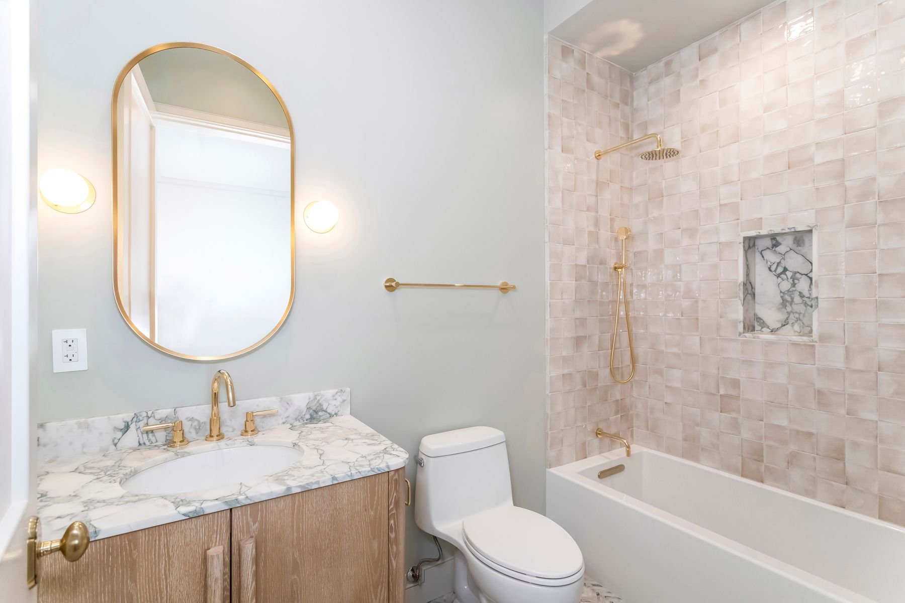 North Kenter avenue bathroom with single vanity and tub