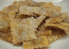 Handmade ravioli coated in rich sauce and finished with a generous dusting of Parmigiano. Pure comfort on a plate.