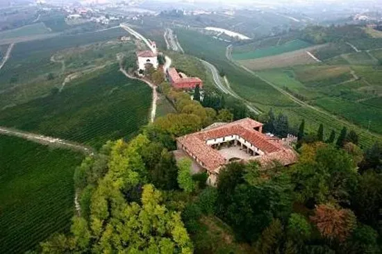 Langhe wine estate in Piedmont, Italy surrounded by vineyards.