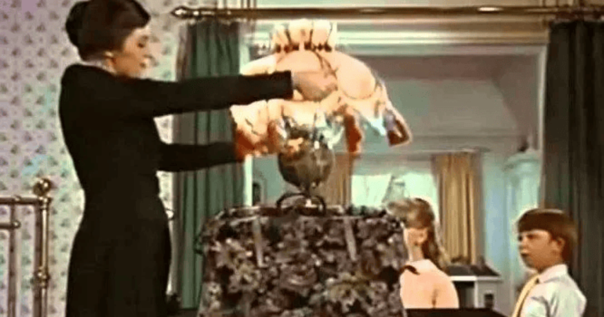 Scene from Mary Poppins, showing her pulling a lamp from her magical carpetbag.