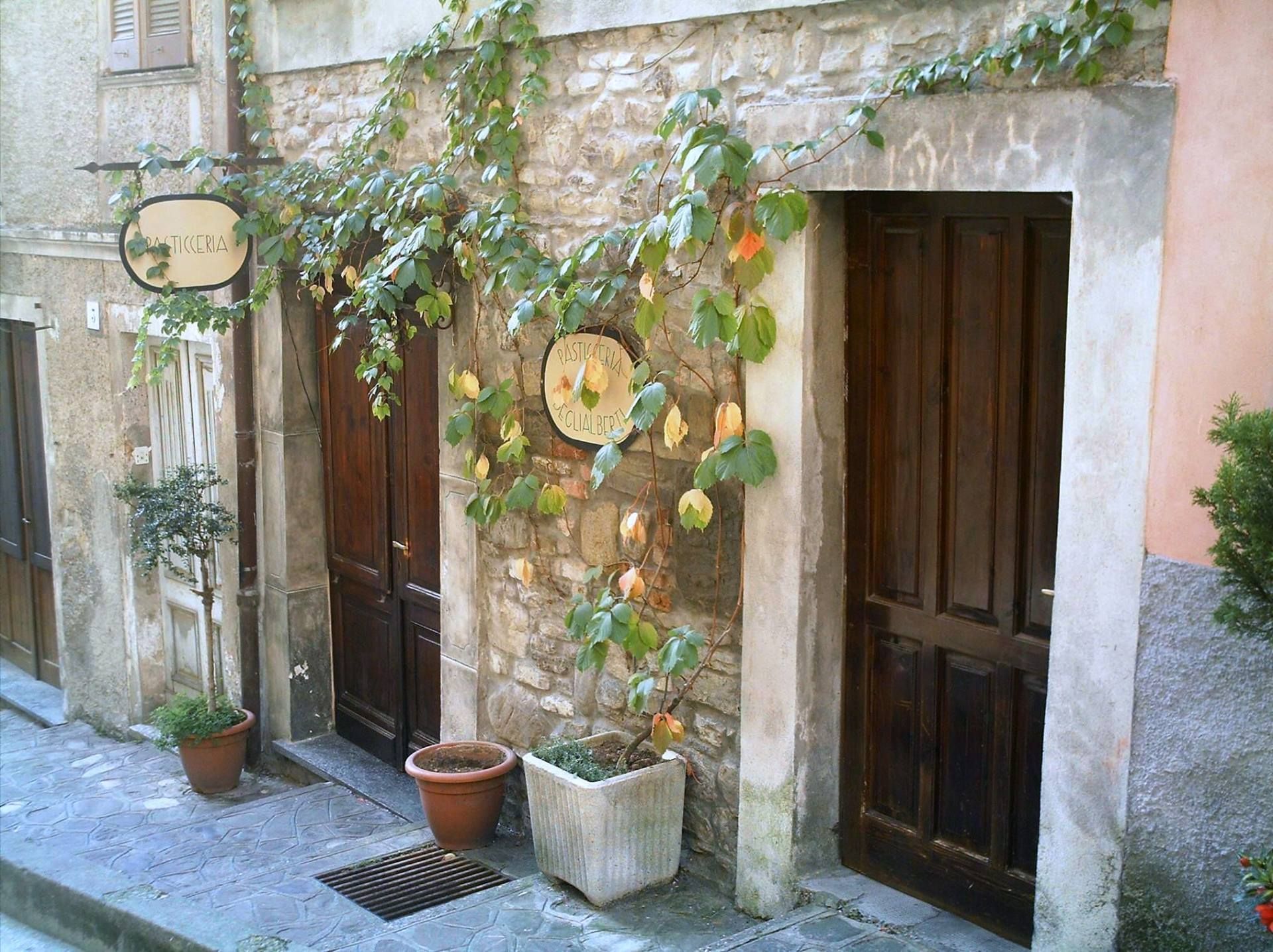 Varzi's little Pasticceria behind the town's main church.