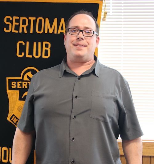 A logo for a company called sertoma on a white background.
