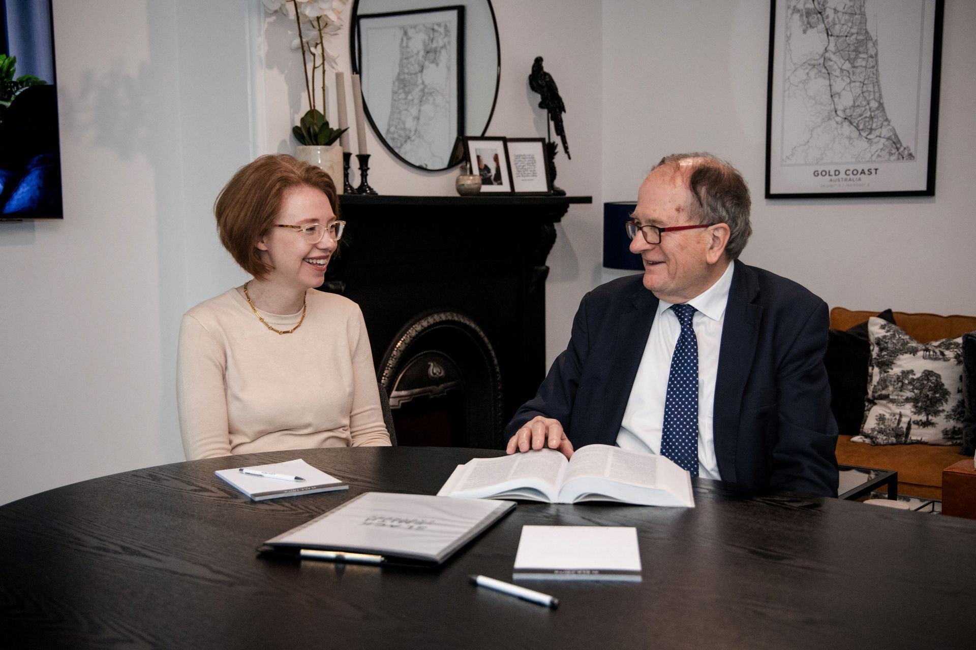 A Woman and Man Seated at a Table, Smiling — Slack-Smith Partners in Tamworth, NSW
