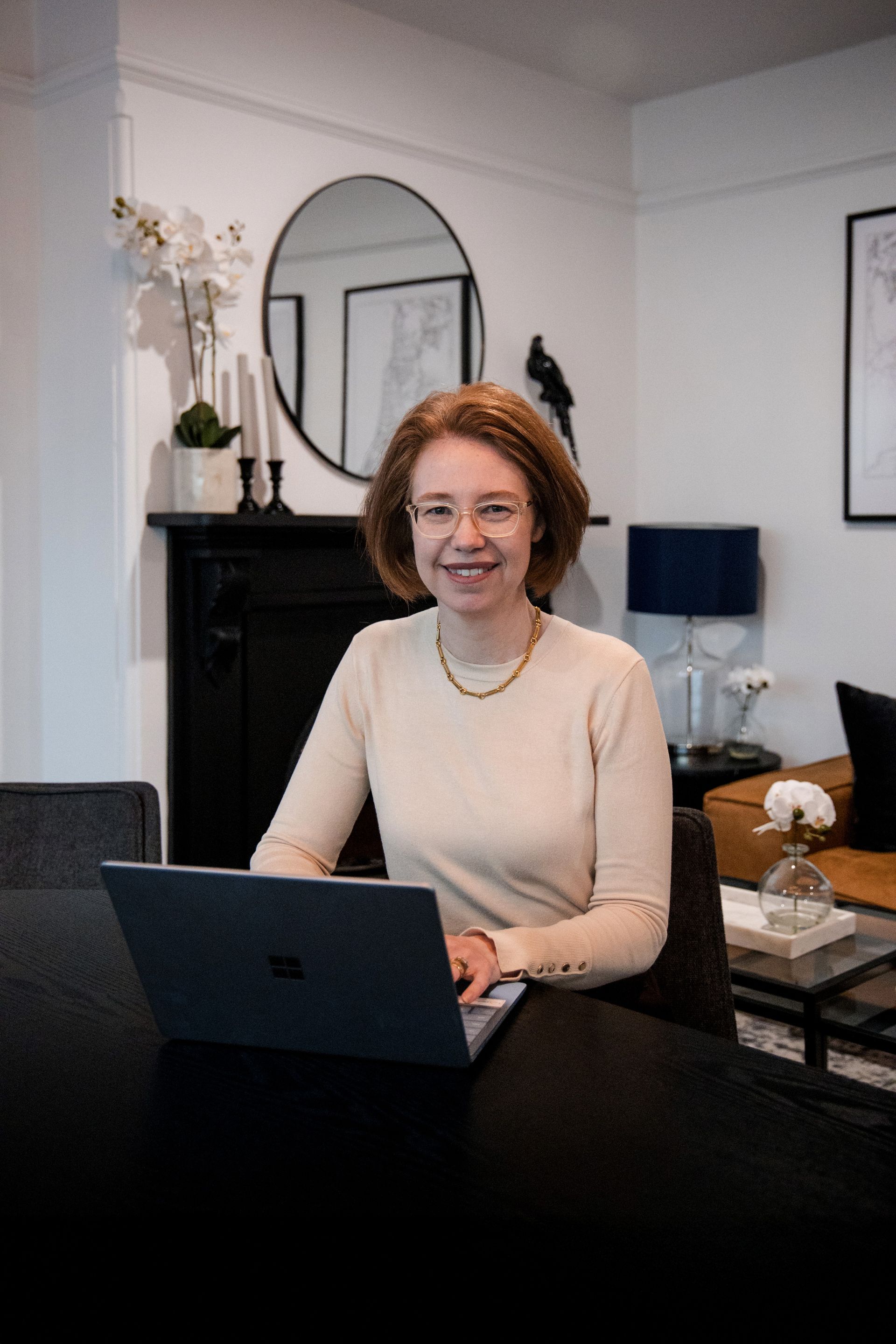 Woman With Glasses Works on Laptop at a Table — Slack-Smith Partners in Tamworth, NSW