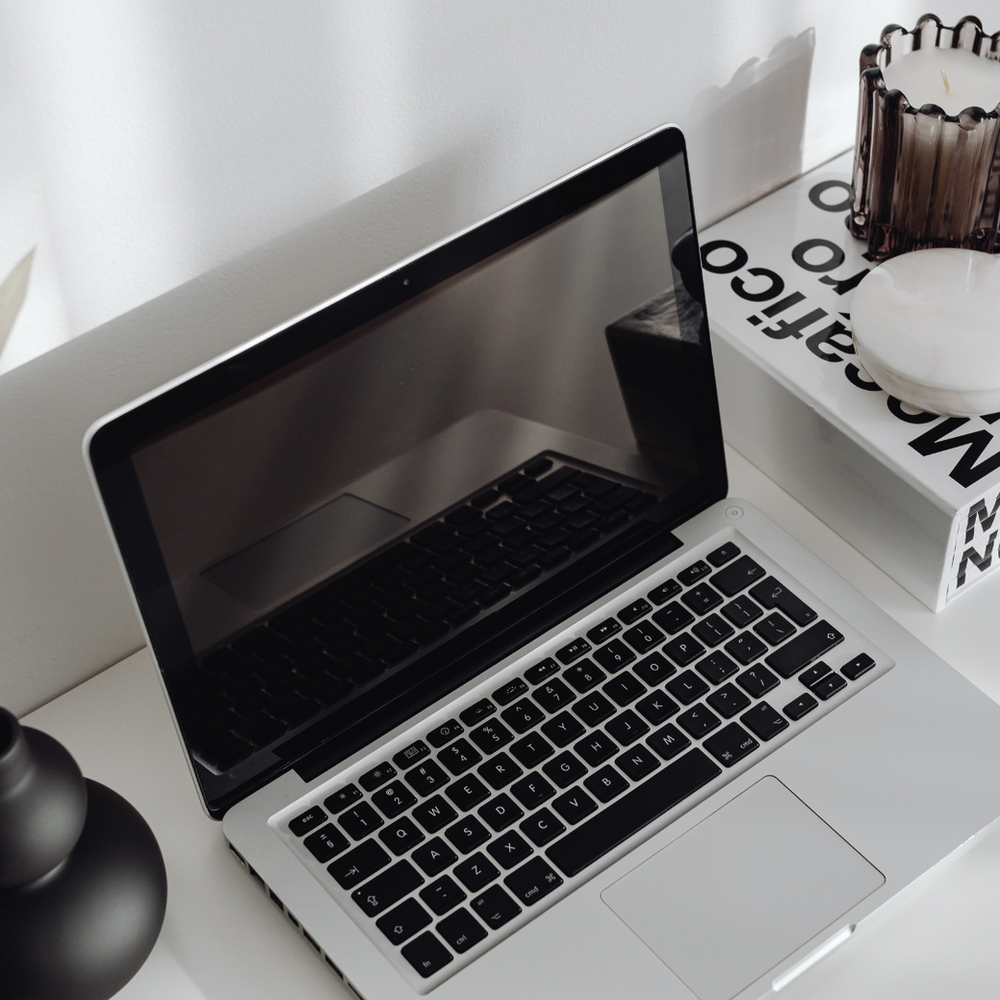 A Laptop Is Open and Sitting on A Desk — Slack-Smith Partners in Tamworth, NSW