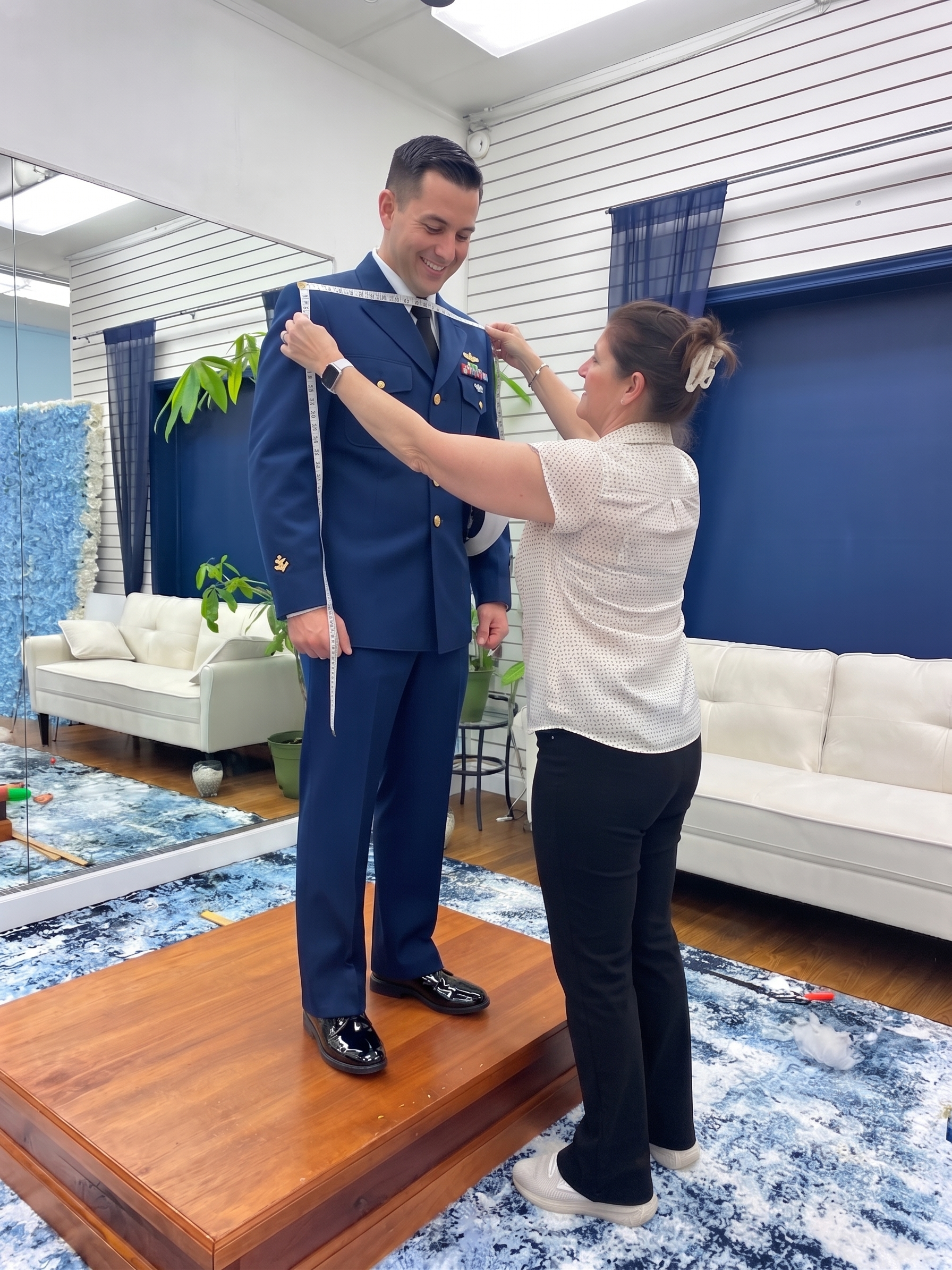 Woman kneels to measure a man’s shoe distance on a wooden platform in a bright room Woman kneels to measure a man’s shoe distance on a wooden platform in a bright room