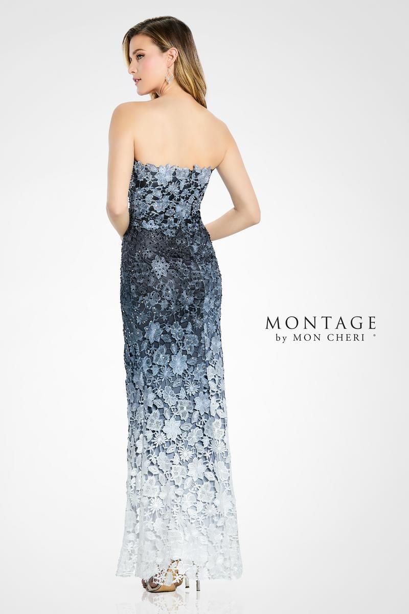 Woman in a blue ombre strapless gown, standing in front of a white background.