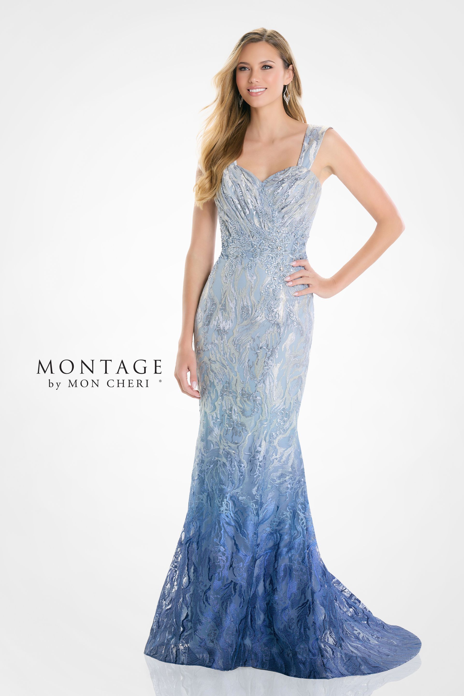 Woman in a sparkly blue ombre gown posing with hand on hip. Woman in a sparkly blue ombre gown posing with hand on hip.