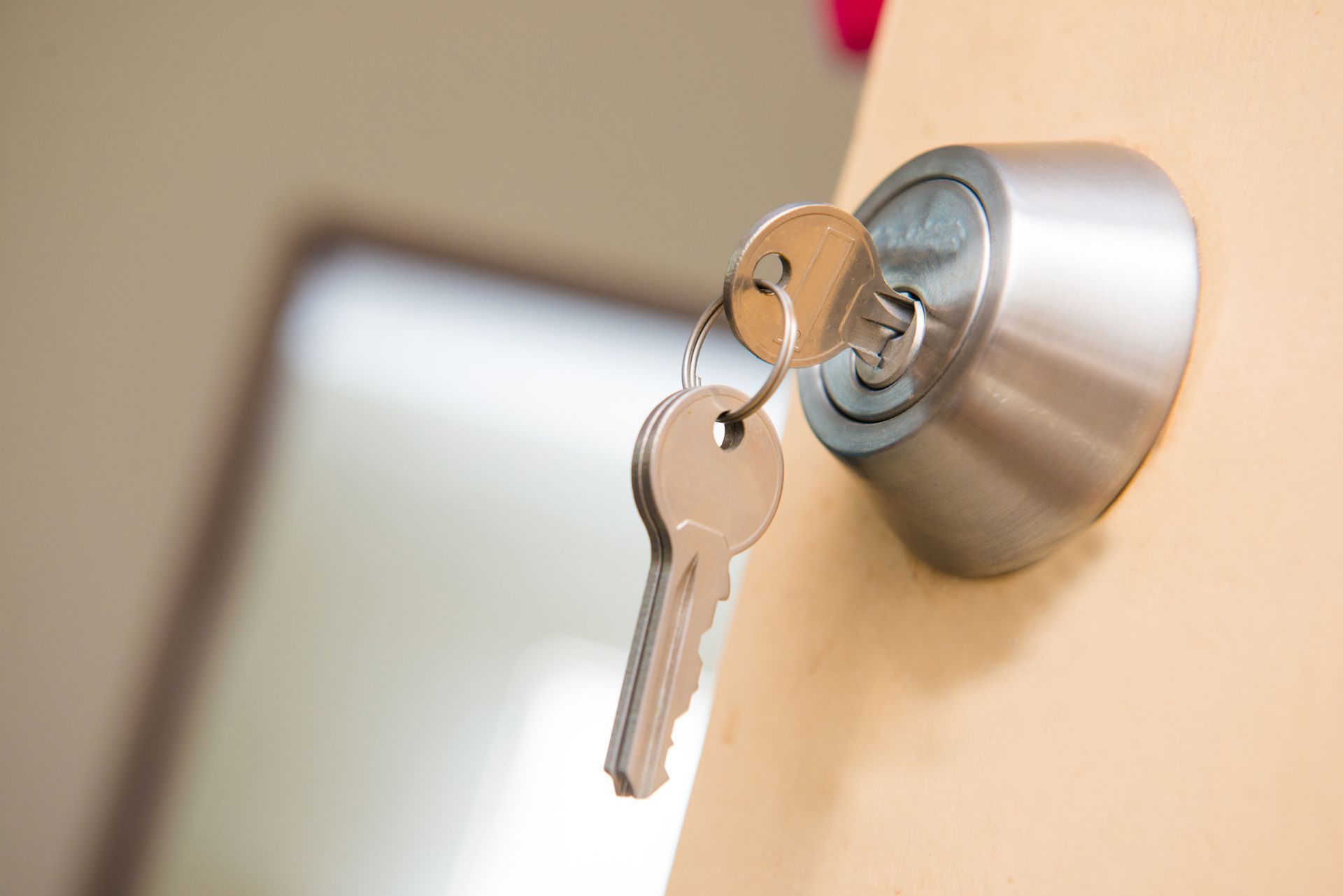 photo of keys in a door