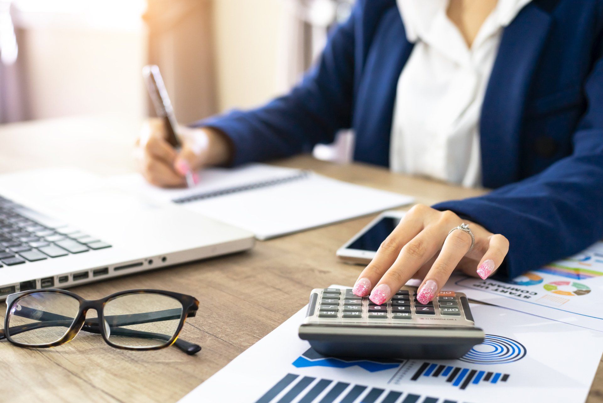 Accountant Calculating Expenses – Whittier, CA – EM Bookkeeping and Tax Service Accountant Calculating Expenses – Whittier, CA – EM Bookkeeping and Tax Service