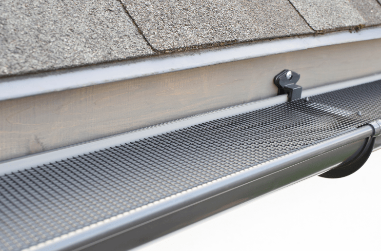 someone doing gutter installation