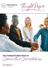 Diverse group with hands together, smiling. Thought paper titled 