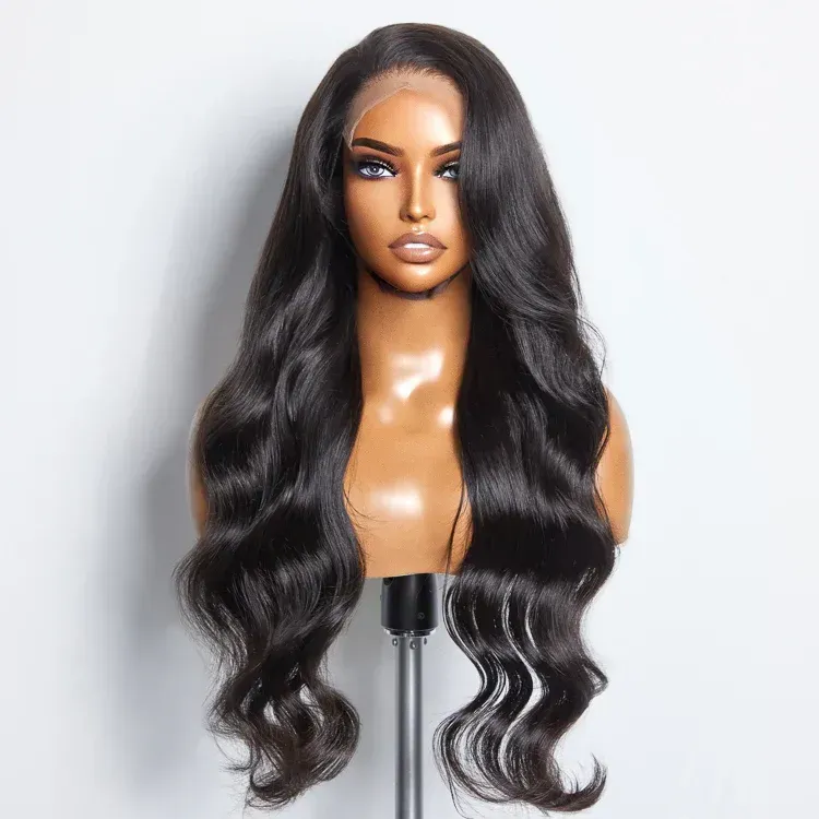 Black wavy wig on a mannequin head, displayed on a stand.