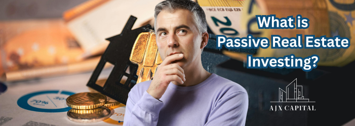 Man thinking beside gold coins and house model with text “What is Passive Real Estate Investing?”