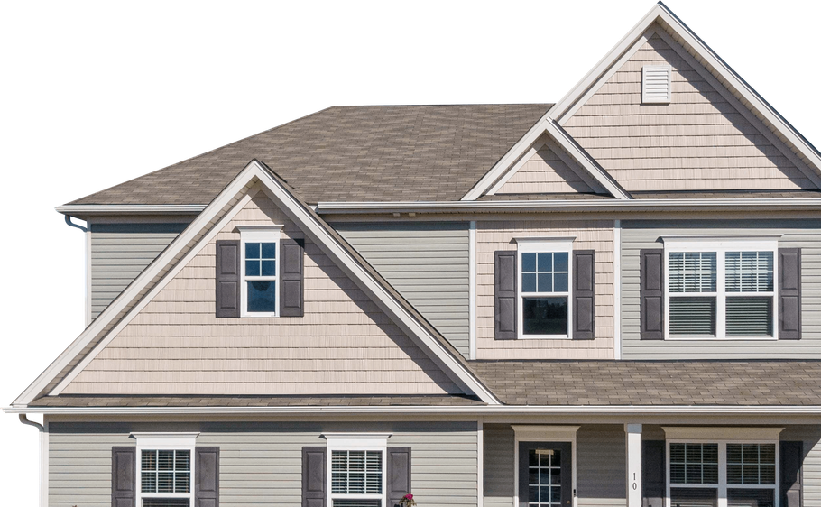 Exterior of a beige suburban house with gray roof and dormer windows