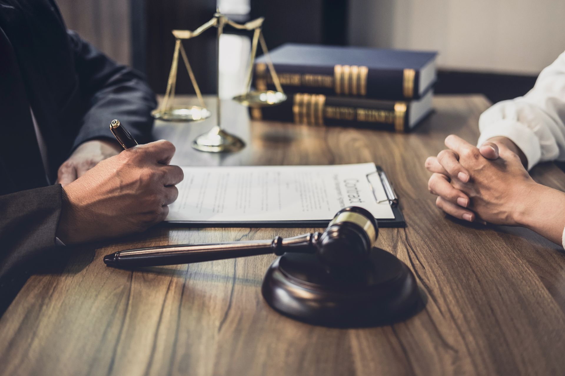 Businesswoman and Male lawyer or judge consult having team meeting with client, Law and Legal services concept.