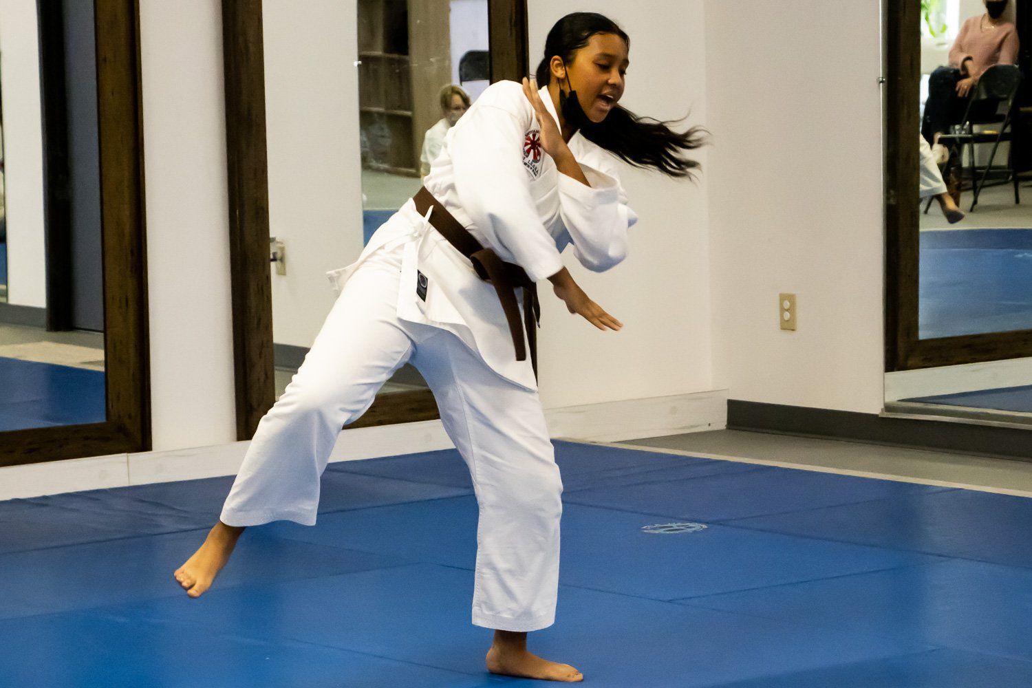 Brown belt student practicing Kata during testing in Dec 2021