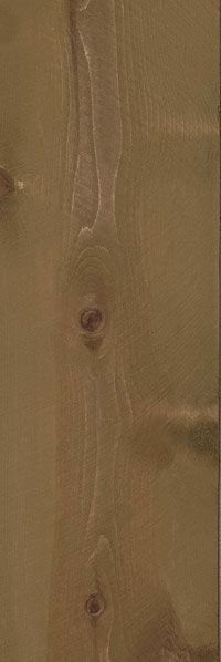 Close-up of a brown wooden surface with visible knots and vertical grain lines.