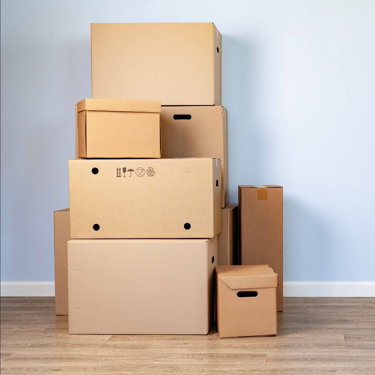 A pile of cardboard boxes stacked on top of each other