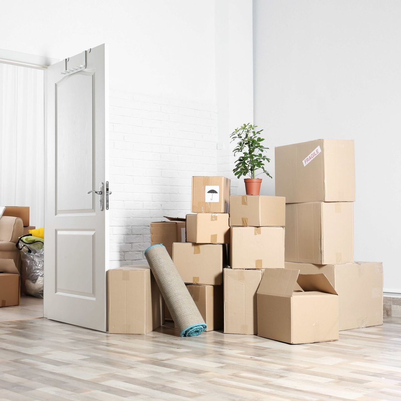a stack of cardboard boxes with one labeled fragile