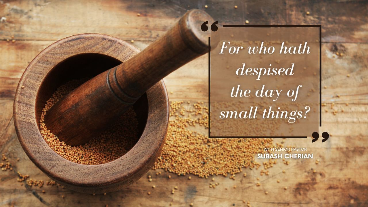 A mortar and pestle with a quote on it on a wooden table.