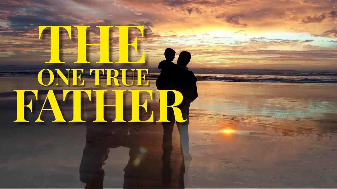 Two people standing on a beach with the words the one true father