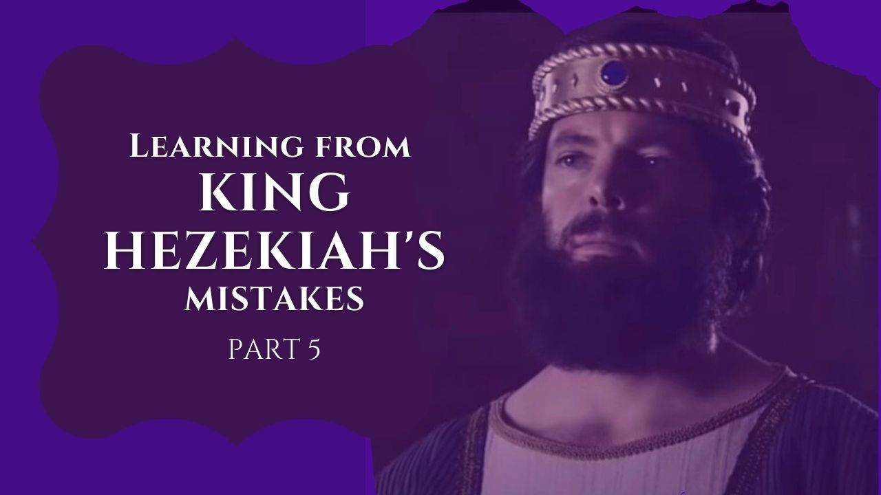 A man with a beard is wearing a crown on his head.