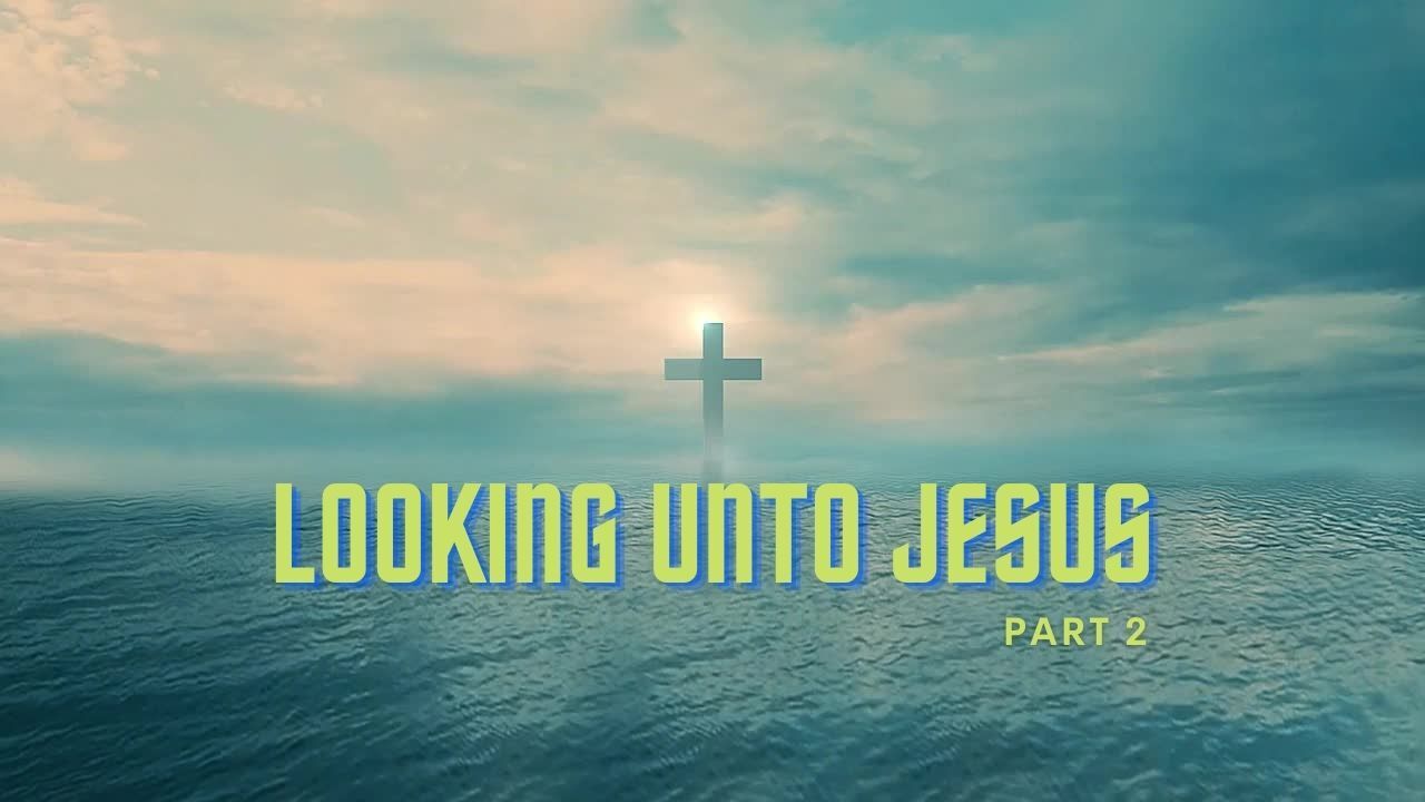 A cross in the middle of the ocean with the words `` looking unto jesus '' part 2.