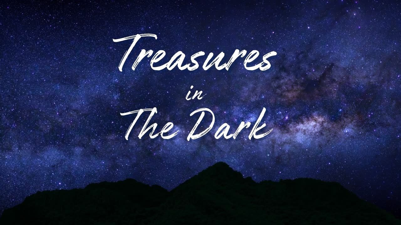 A poster for treasures in the dark with a mountain in the background