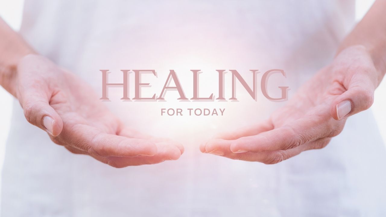 A person is holding the word healing in their hands.