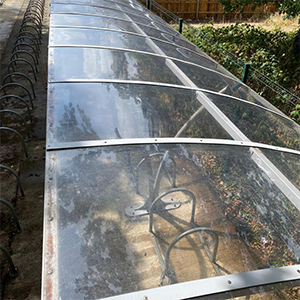 results of exterior cleaning on glass canopy bike shed