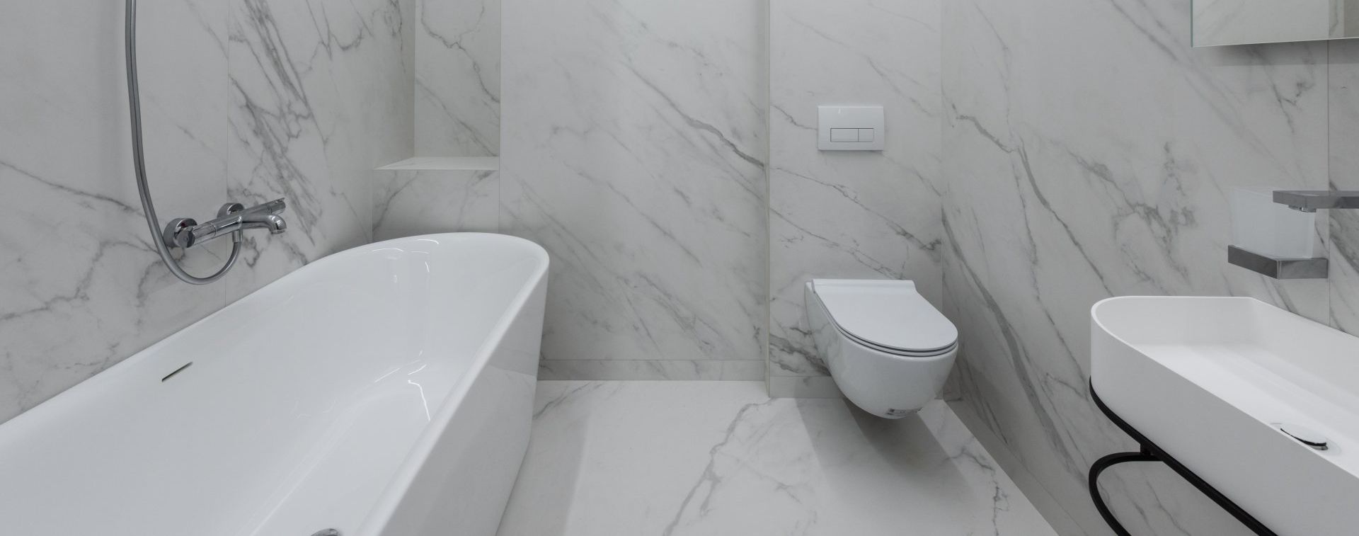 a bathroom with a bathtub toilet and sink