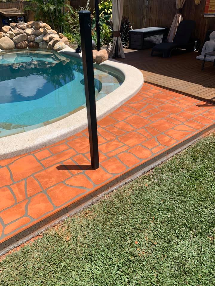 Terracotta Stencil Design Around Pool Yard — Outdoor Concreting in Townsville, QLD