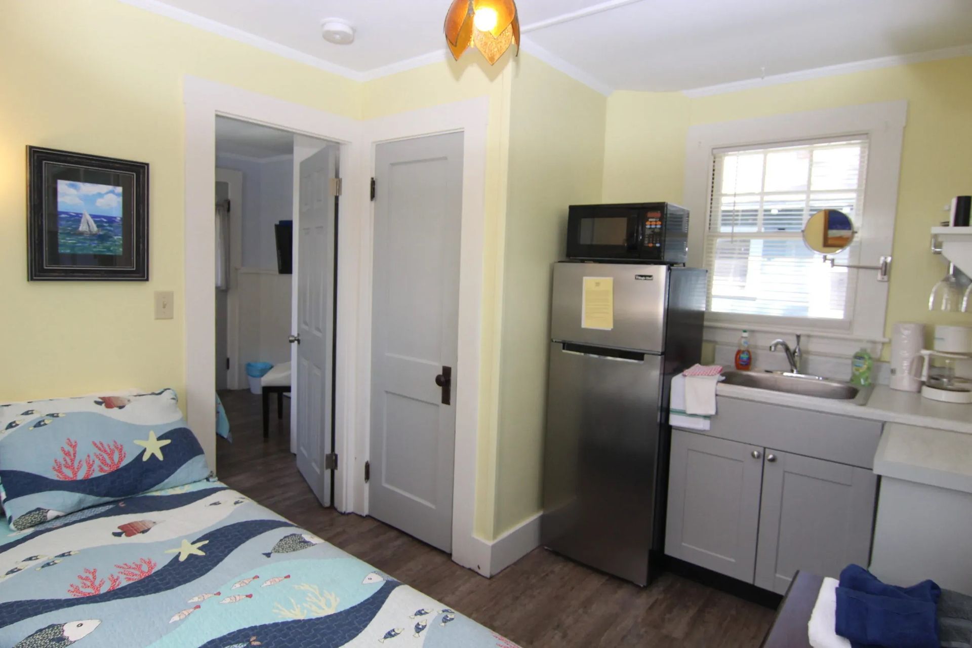 Small studio apartment with bed.
