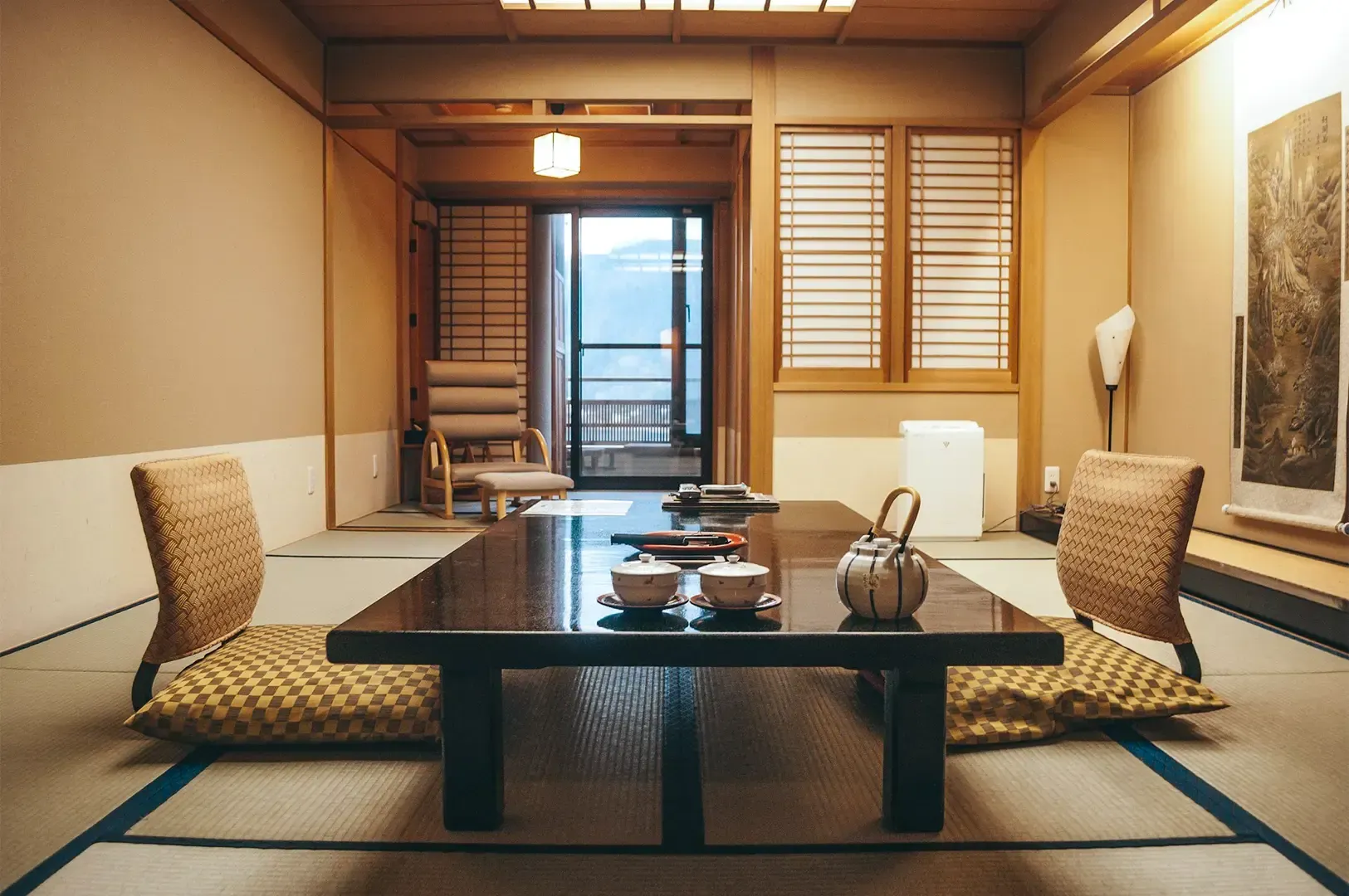 A hotel room with a modern Japanese style interior.