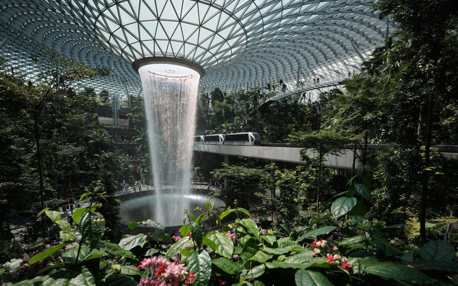 The Assistant's Singapore : Aerial view of Singapore’s urban landscape as the plane descends toward Changi Airport.