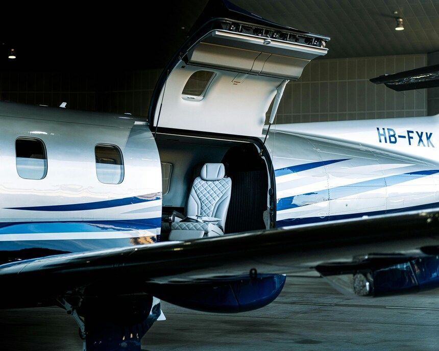 The Reality of Constant Travel : Luxurious private jet cabin with plush seating for high-flying journeys