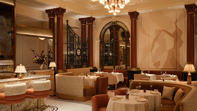 Private Dining Experiences : Fine dining table arranged with silverware and candlelight in The Savoy penthouse.