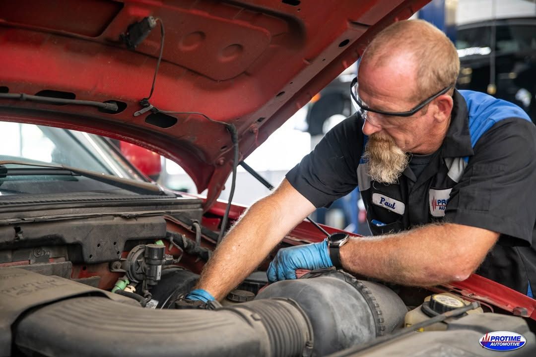 Technician Performing Engine Bay Repair | Protime Automotive