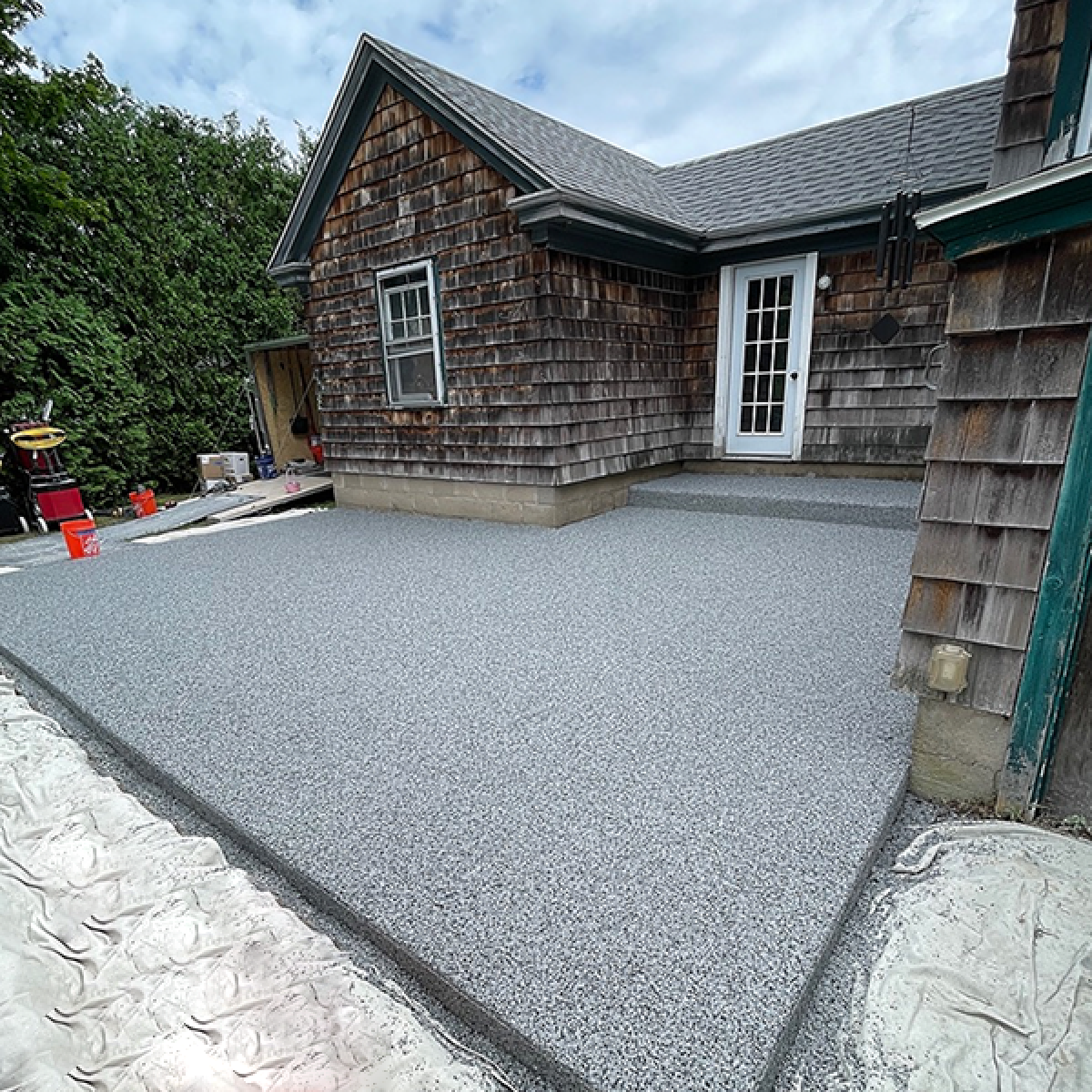 A solid concrete coating patio for a residential house