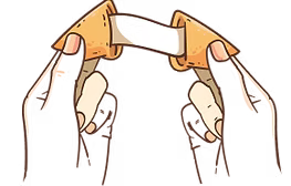 Hands opening a fortune cookie, pulling out a white paper.