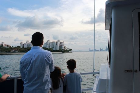 Fisher island passengers and kinds enjoying view